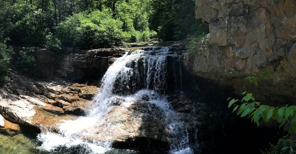 Looking for hikes near Crabtree Falls where cool rivers and forest shade meet adventure? Saint Mary’s Wilderness leads you through stream crossings, mossy trails, and a hidden waterfall perfect for summer days.