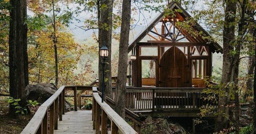 Want a micro wedding venue in the Blue Ridge Mountains with unforgettable views? Nolichuckey Bluffs Glass Chapel in Tennessee offers a glass-front ceremony space for tiny, scenic weddings.